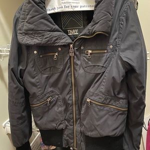 Black Aritzia jacket!!! Great for winter and to keep you cozy and warm.